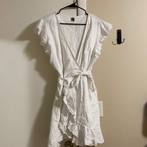 Very cute white ruffled wrap dress from SHEIN! Was too big for me.